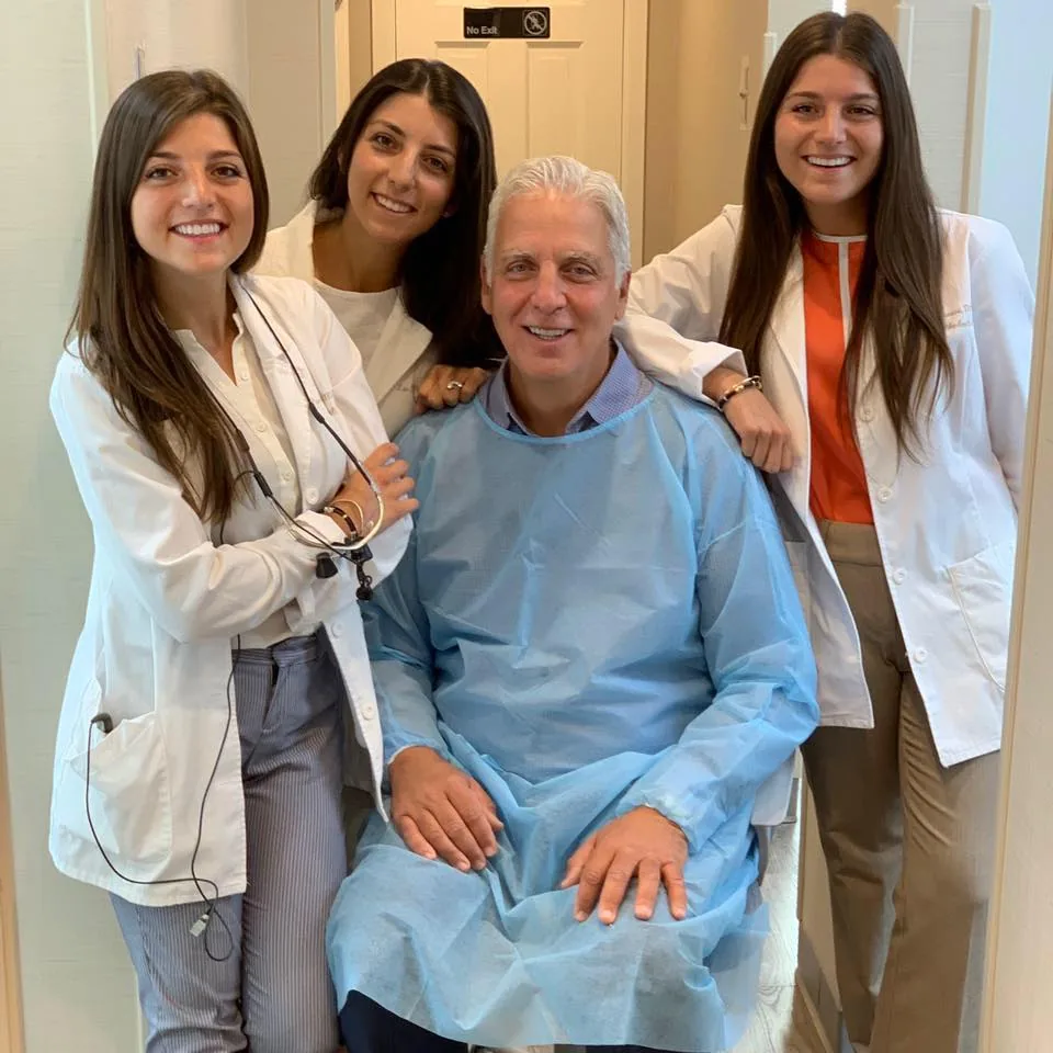 Drs. Thomas, Lea, Penny & Melena Planzos @ Impressive Dental Care photo 3